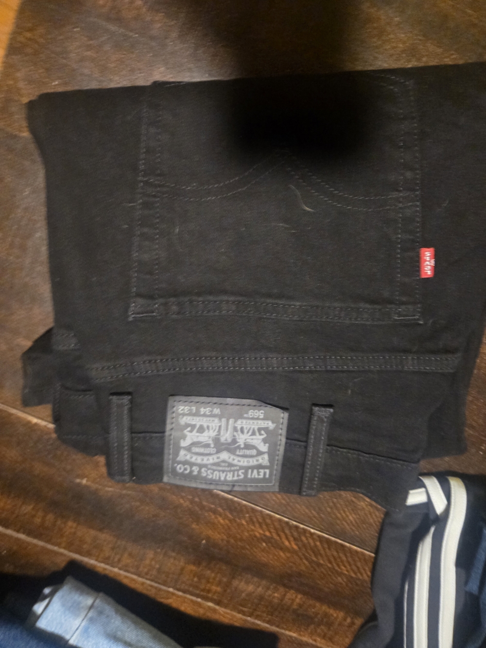 Levi's Men's Relaxed Black Jeans with Signature Red Tab